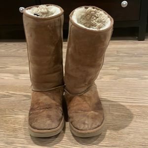 Used Size 8 Tall tan Uggs. Need a good clean and have been used.